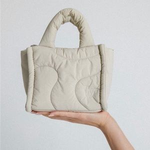 Thirty Years mini drift tote in “pebble”. Brand new with original packaging.